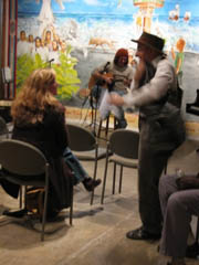 Dane Ferguson performing music for the open.