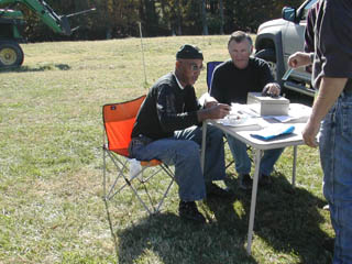 Jerry Robinson and Carter Thompson check in riders